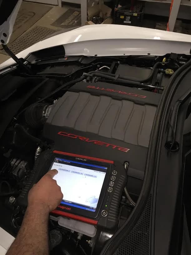 Snap-on diagnostic tablet on a Corvette engine at Jack's Auto Repair