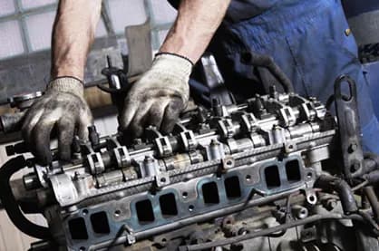 Jack's technician performing hands-on engine repair and rebuild work