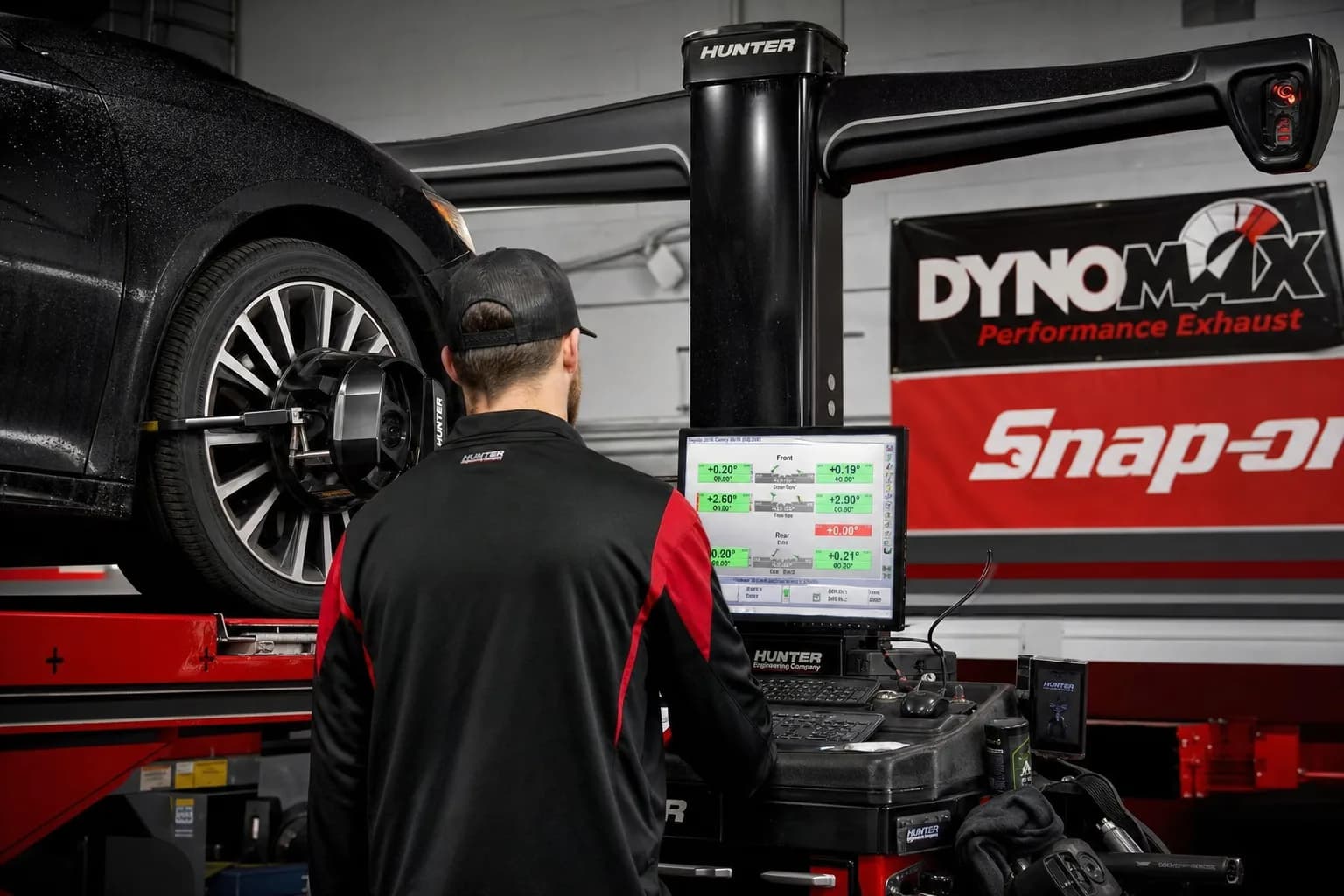 Front suspension inspection after Michigan pothole season at Jack's Auto Repair